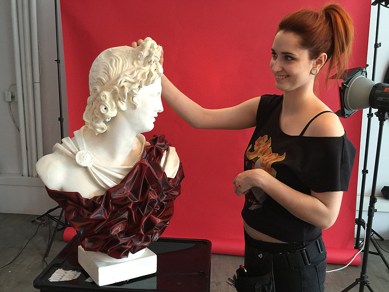 Photo of a model in Spartacus costume with creative hair, captured in a fashion-focused Montreal studio