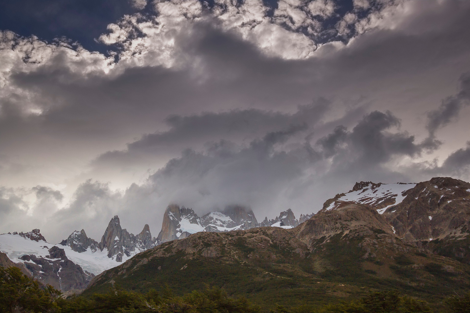A dramatic timelapse shoot with beautiful clouds passing throuth Fitz Roy summit. Patagonia
