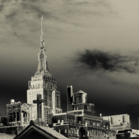 Rooftops in Manhattan with cross on top