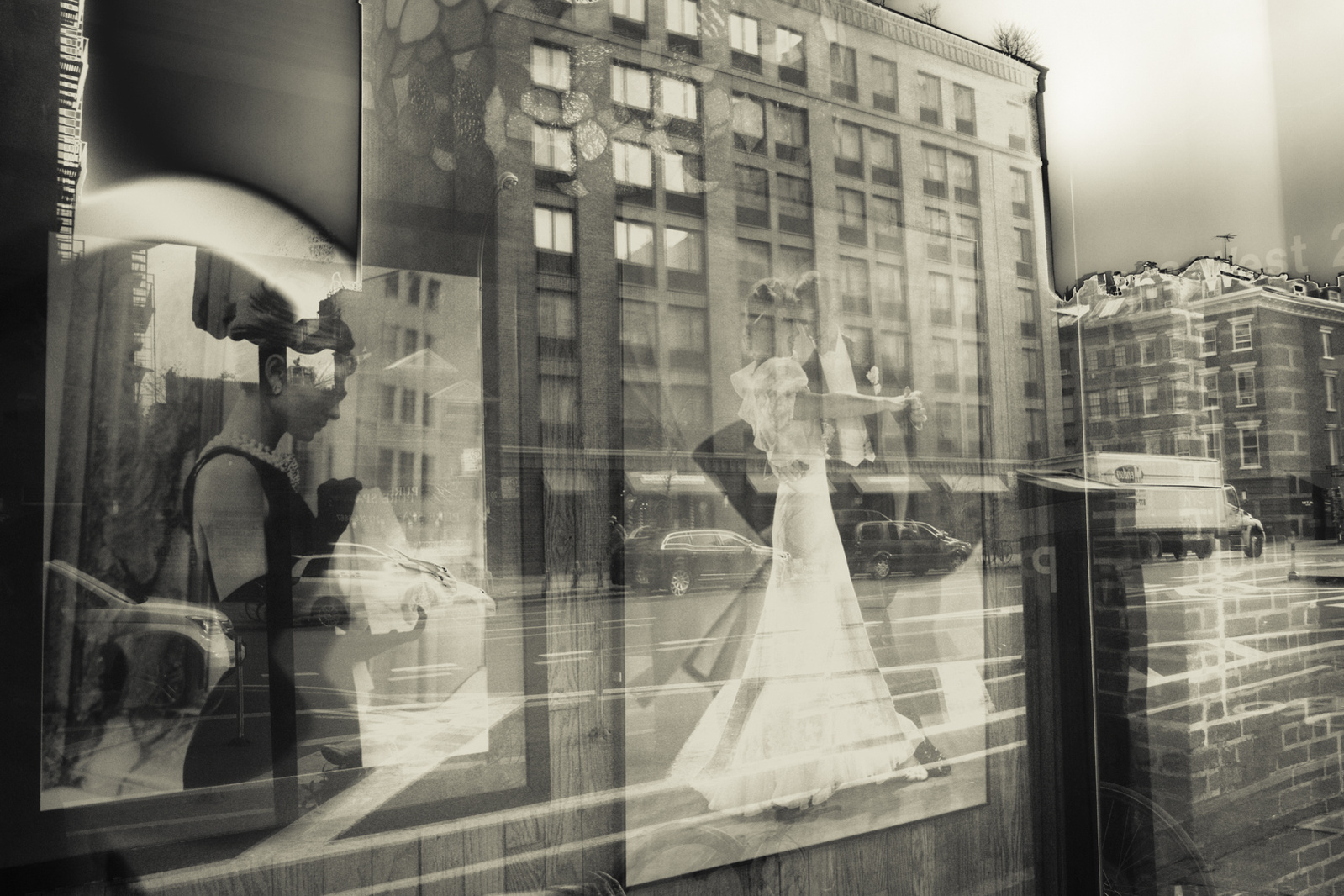 Window reflection in Manhattan with Fred & Ginger & Audrey Hepburn