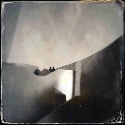 Black and white iPhone tintype of two silhouetted people atop Walt Disney Concert Hall in Los Angeles