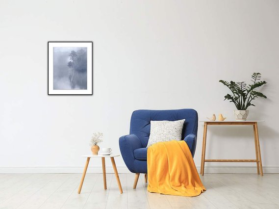This little morning coffee spot with its comfy blue chair and throw call for a painterly soothing picture on the wall above.