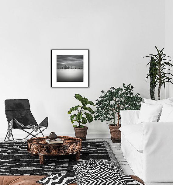 Bring together your black and white decor with this calming B&W minimalist picture of a cloudy sunrise over the lake cypress.