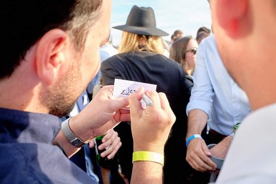 Corporate fun day photography at Sunborn Yacht Hotel by Josh Caius, with magician Magic Mike for a finance firm in London.