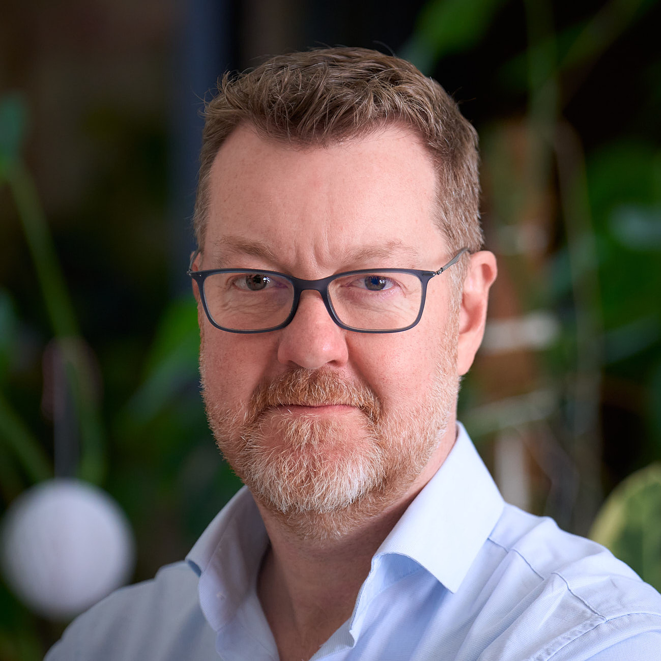 Headshot of co-managing director of a production company, photographed by Josh Caius