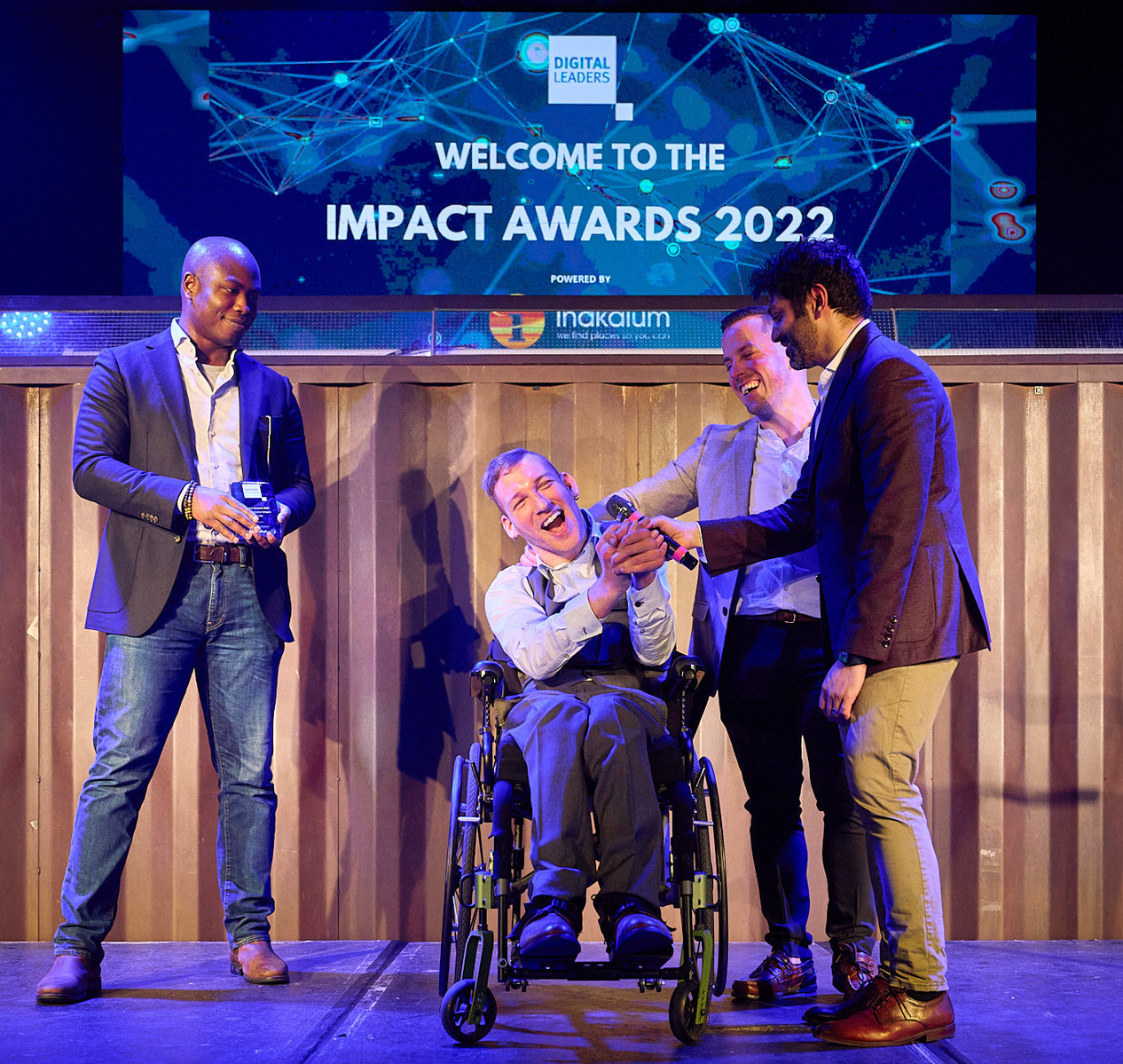 Posed award ceremony and corporate party photography by Josh Caius at Ministry, Southwark.