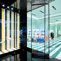 Luxury brand interiors and window display store photography by Josh Caius in White City, London