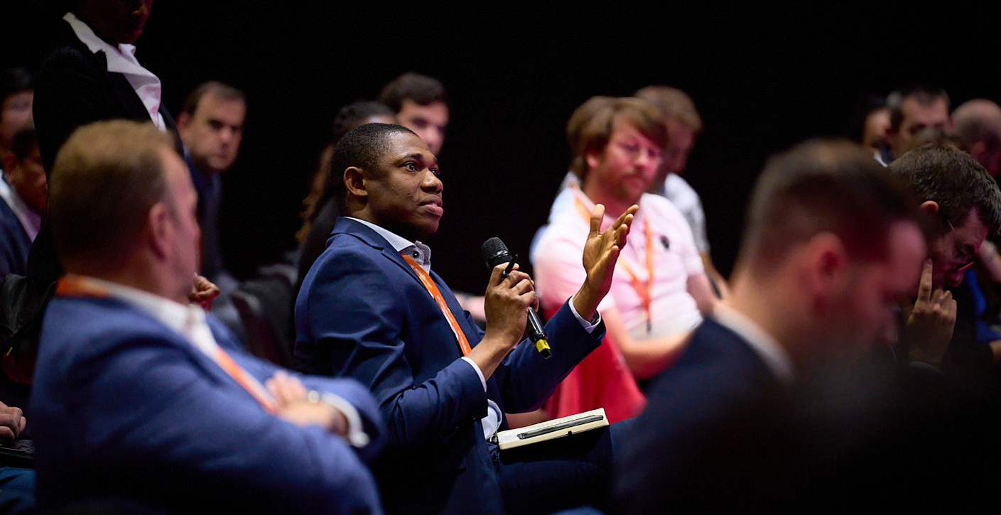ExCel Centre corporate event photography by Josh Caius, in a reportage style.