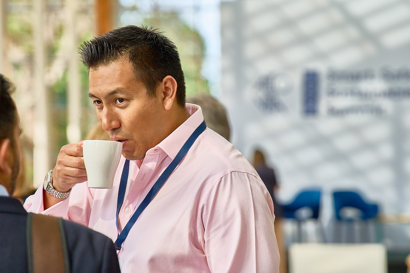 Close up candid photography of delegates at a corporate travel panel discussion at Kew Gardens London