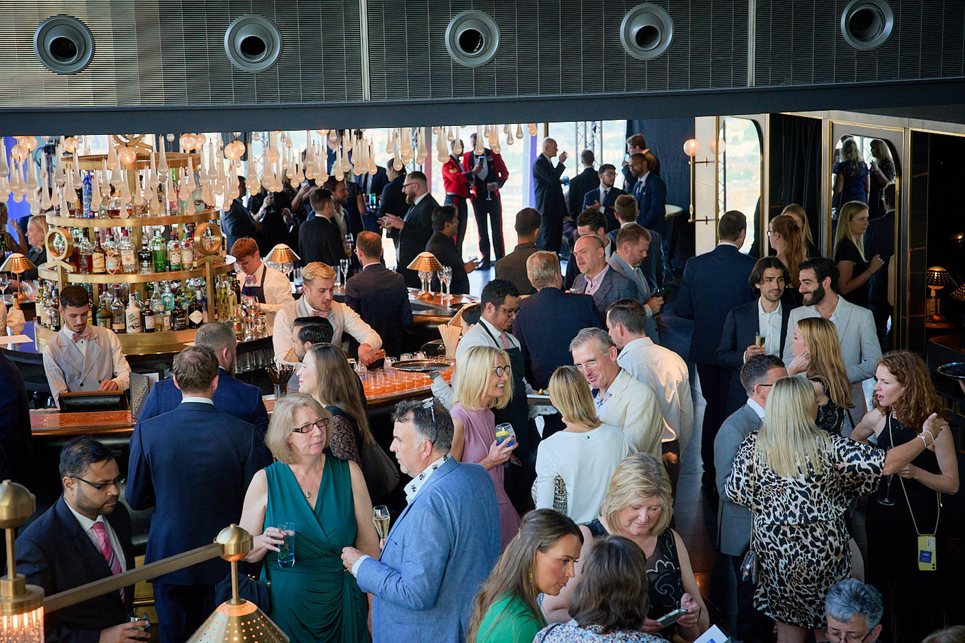 Wide angle photo of the event at an awards ceremony at Aqua Shard, London.