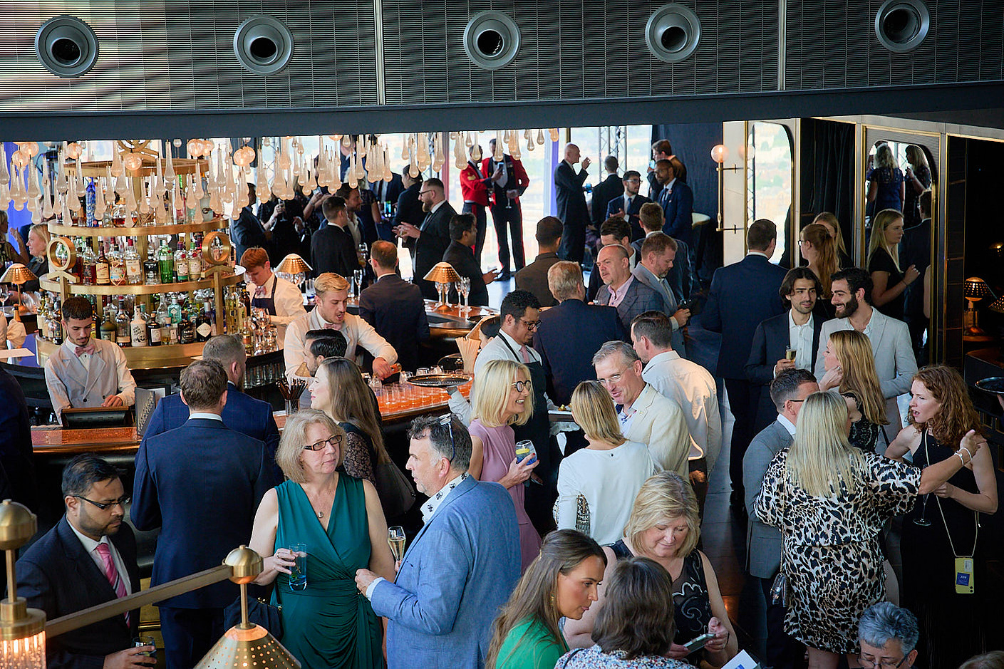 Wide angle photo of the event at an awards ceremony at Aqua Shard, London.