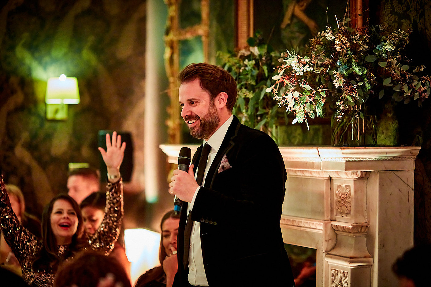 Corporate party photographer Josh Caius in London. Candid, fun photography for an award ceremony and gala celebration.