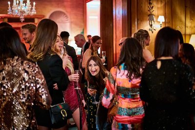 End of year party photographer for corporate events in London. This photo was taken at 30 Pavilion Road. Natural audience reactions captured during the event.