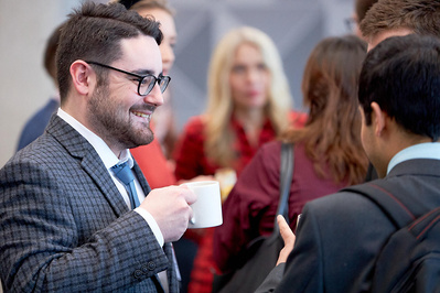 Josh Caius is a photographer for corporate event photography, particularly for business meetings, panel discussions and networking events.