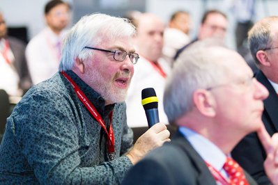 Josh Caius, a London based event photographer for corporate meetings and panel discussions.