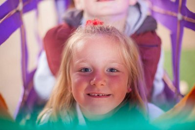 Community event photography by Josh Caius. A child playing at a public event put on by the local Council in London.