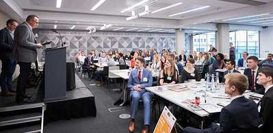Josh Caius is a photographer for corporate event photography, particularly for business meetings, panel discussions and networking events.