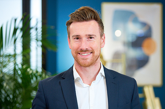 Indoor headshot portraits for interior design company Peldon Rose. Less formal in style.