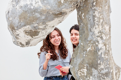 Art gallery and museum photography for Art Fund at the Royal Academy in London. Two women look at a Phyllida Barlow sculpture.
