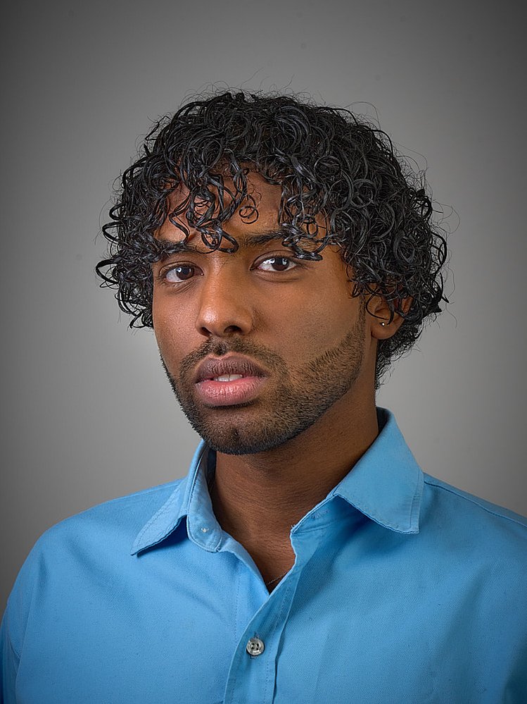 London based corporate headshot photographer for plain background head shots. Retouching included in the price.