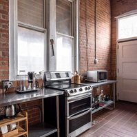 Detroit photo studio for daily rental. Kitchen available in lounge. Functioning stove and microwave and toaster.