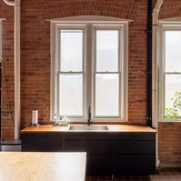 Detroit photo studio for daily rental. Kitchen available in lounge. Sink and prep space, dining space, meeting space.
