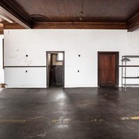 Overview of photo studio space available for daily rental with gear, lighting, grip, tethering station.