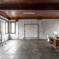 Overview of photo studio space available for daily rental with gear, lighting, grip, tethering station.