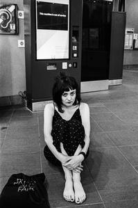 Photograph from the series To Live and Die in Lancashire: The Chapel of the Roses by Matthew James Fleming. Taken with a Leica M6 and Ilford HP5 35mm film. 
H waits at St. Helens Central for a train.