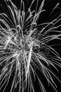 Photograph from the series To Live and Die in Lancashire:The Chapel of the Roses by Matthew James Fleming. Taken with a Leica M6 and Ilford HP5 35mm film. 
Fireworks burst over Clitheroe, during the annual bonfire.