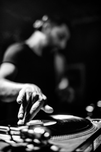 Darius Syrossian mixing vinyl during a performance at the Lancaster University (later: Underground) Electronic Dance Music Society LUEDMS. March 2015. Photograph by Matthew Fleming.