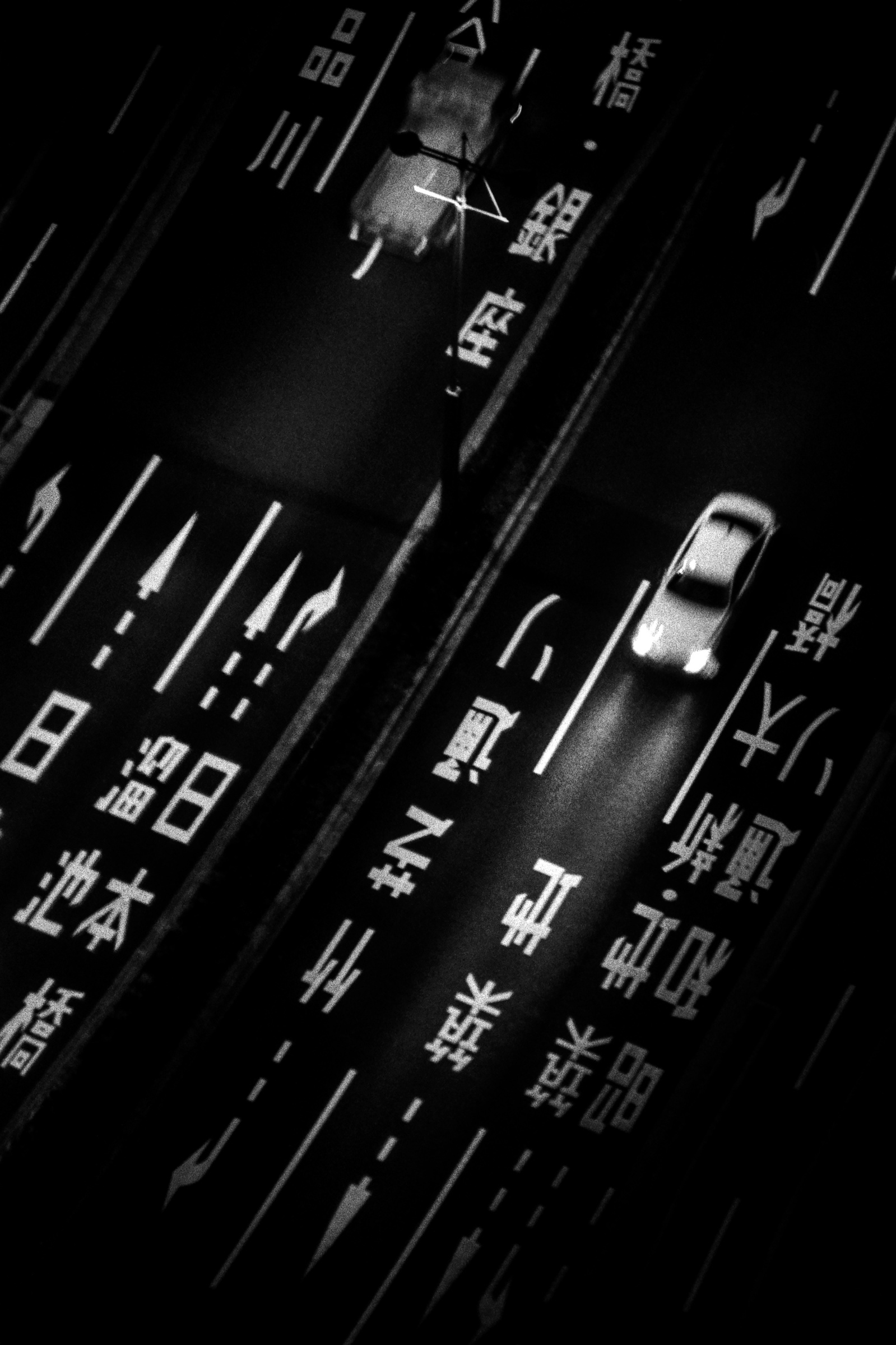 Cars on a highway road, Shinjuku, Tokyo, June 2018. Photographed by Matthew Fleming on 35mm Ilford HP5 film with a Nikon F100.