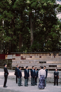 Students listen to a Shinto priest talking about the ground at Nikko, just outside the Toshogu shrine. 
Photograph taken with Leica M6 and Kodak Portra 400 by photographer Matthew Fleming.