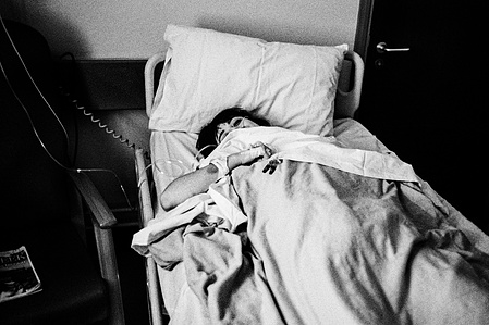 Photograph from the series To Live and Die in Lancashire: The Chapel of the Roses by Matthew James Fleming. Taken with a Leica M6 and Ilford HP5 35mm film. 
H post surgery. Liverpool Heart and Chest Hospital.