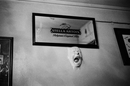 A plaster face screams from the wall in Fringe Bar, Manchester.
Photograph from the series To Live and Die in Lancashire: Wet Paint by Matthew James Fleming. Taken with a Leica M6 and Ilford HP5 35mm film.