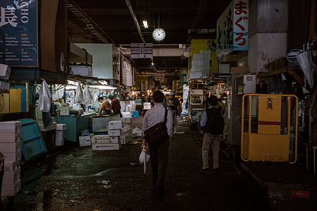 A man walks through the now closed Tsukiji Fish Market, Tokyo. 
Photograph from the series Forbidden Colours by Matthew James Fleming. Taken with a Leica M9.