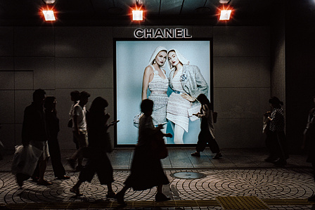 People pass by a Chanel advert at Shinjuku train station, Tokyo. 
Photograph from the series Forbidden Colours by Matthew James Fleming. Taken with a Leica M6 and Cinestill 800T 35mm film.