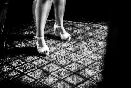 A patron at a pub singing Karaokes feet swaying in the low light, Clitheroe.
Photograph from the series To Live and Die in Lancashire: Wet Paint by Matthew James Fleming. Taken with a Leica M6 and Ilford HP5 35mm film.