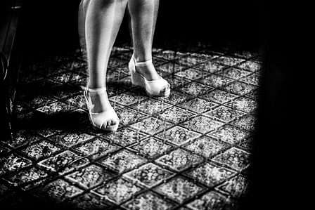 A patron at a pub singing Karaokes feet swaying in the low light, Clitheroe.
Photograph from the series To Live and Die in Lancashire: Wet Paint by Matthew James Fleming. Taken with a Leica M6 and Ilford HP5 35mm film.