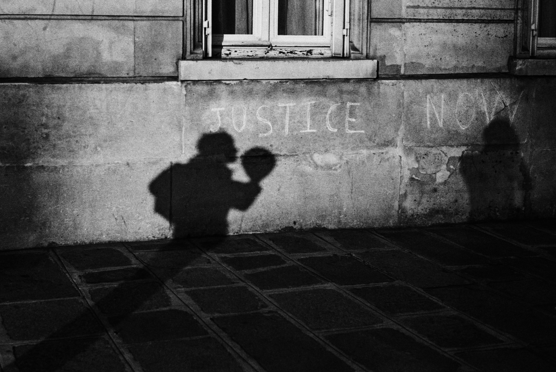 Shadows on Paris streets, March 2016. Photographed by Matthew Fleming on 35mm Ilford HP5 film with a Leica M6.