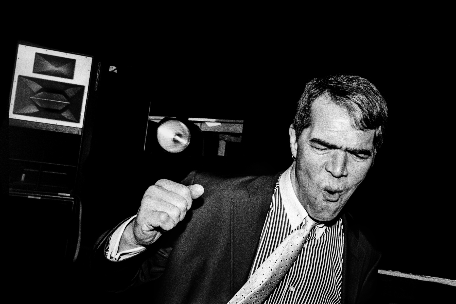 A reveller, dancing at a drum and bass night in Lancaster, Lancashire, February 2017. Photographed by Matthew Fleming on 35mm Ilford HP5 film, with a Leica M6.