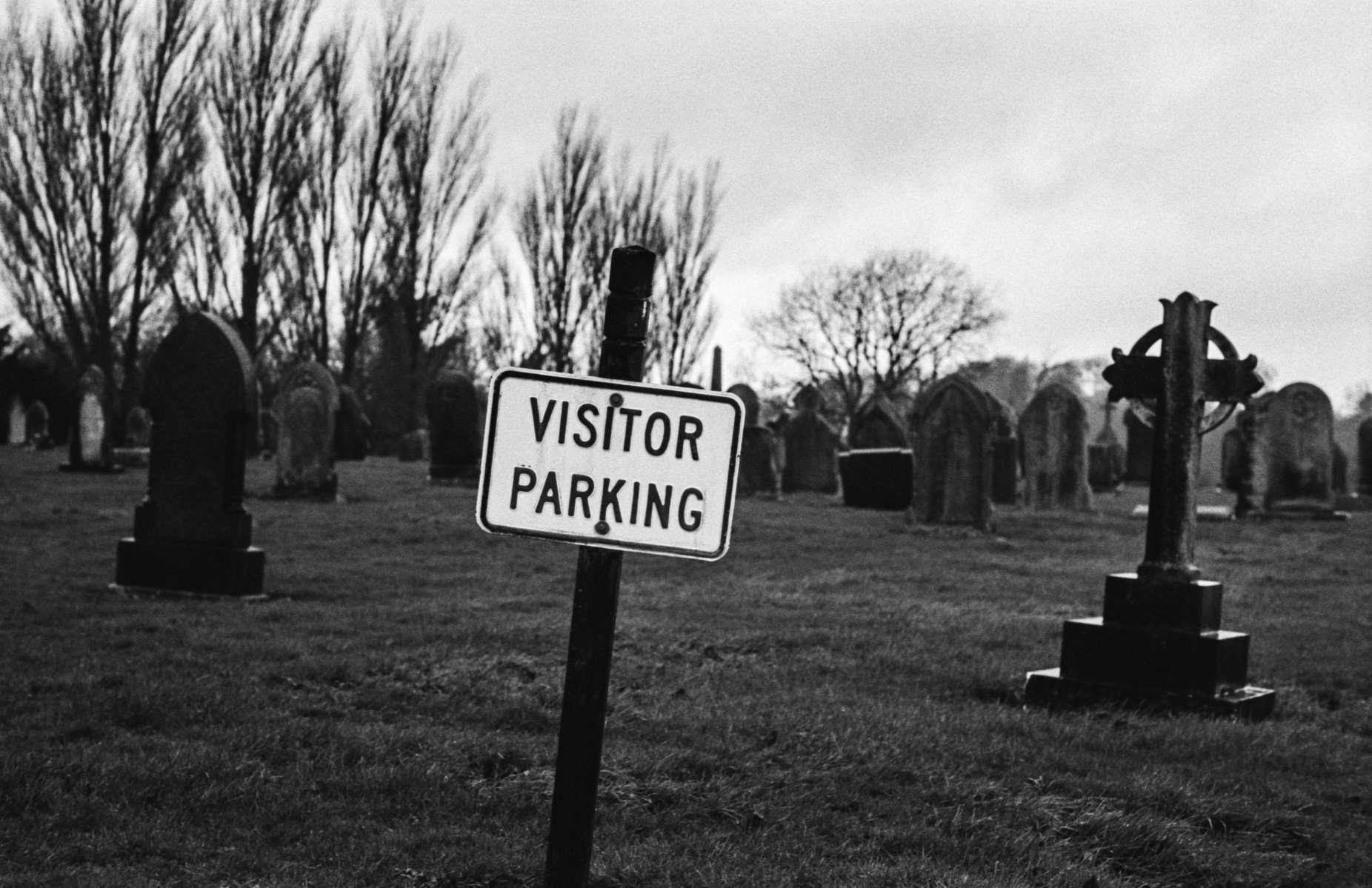 Visitor Parking at a Clitheroe, Lancashire, graveyard. Photographed by Matthew Fleming on 35mm Ilford HP5 film with a Leica M6.