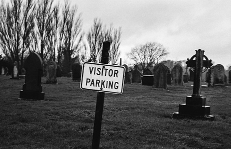 Visitor Parking at a Clitheroe, Lancashire, graveyard. Photographed by Matthew Fleming on 35mm Ilford HP5 film with a Leica M6.