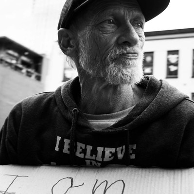 Black and white street photography of the french street photographer David Décamps representing a man homeless in Nashville, USA.