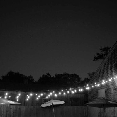 Black and white street photography of the french street photographer David Décamps representing a sky during the night in Natchez, USA.