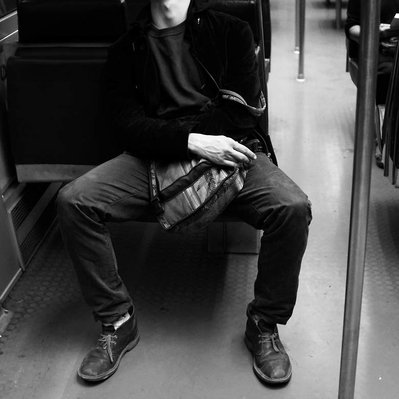 Black and white street photographic serie of David Décamps called Underground representing portraits of people in the subway in Paris.