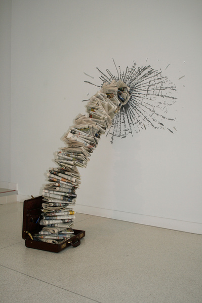 Money Never Sleeps
Suitcase, Wallstreet Journals, pens, mirrored plexiglass, aerosol paint