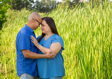 A hispanic couple take a moment together 