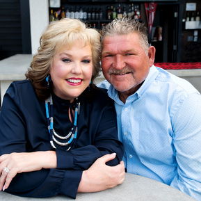A couple sit at a table together in Florida