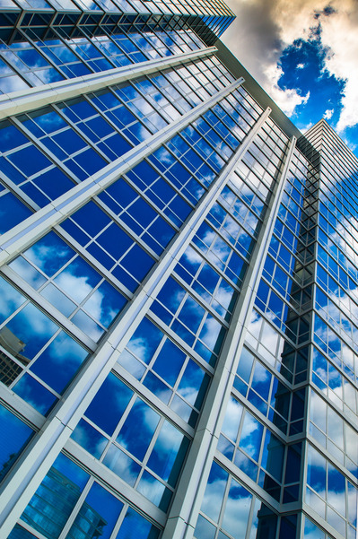 Clouds reflecting in an abstract view on a window façade of a Chicago high rise 